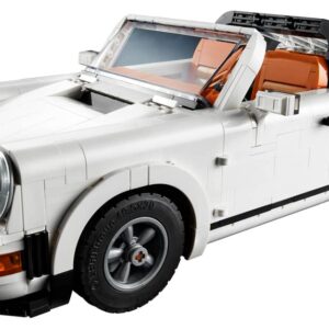 LEGO Porsche 911 Icons model built in clean classic white showcasing its sloping hood aerodynamic lines and round headlights on a display surface