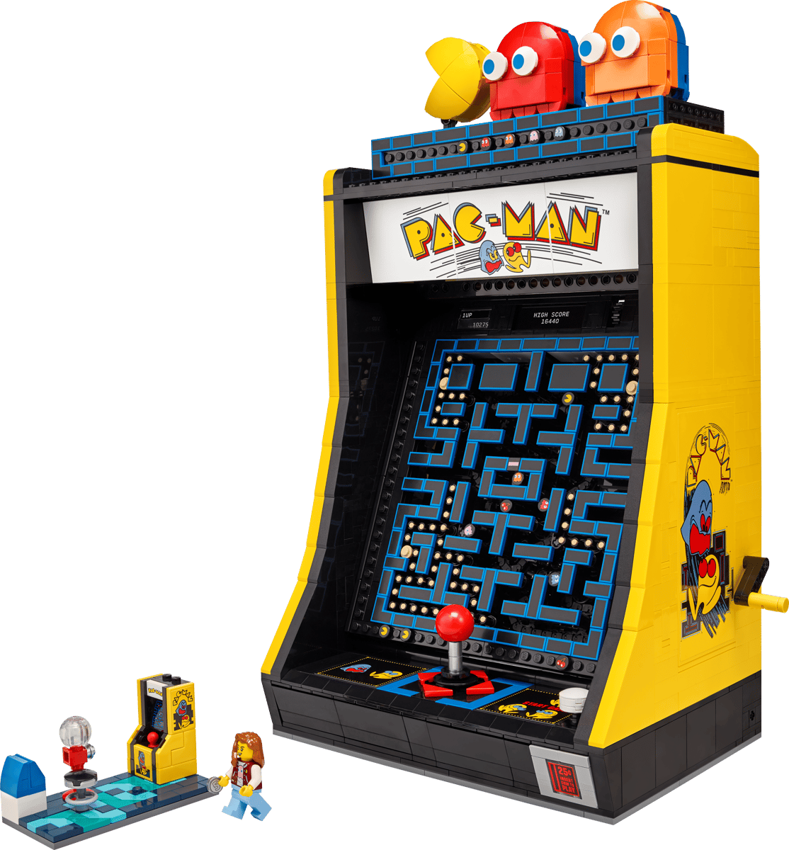 A highly detailed replica of a retro arcade game machine built entirely from bricks celebrating the classic PAC-MAN Arcade LEGO design with a bright yellow cabinet casing