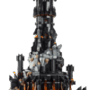 The fully constructed Barad dur LEGO tower set showcasing its massive black spires rising from a volcanic base up to the glowing orange eye structure at the top