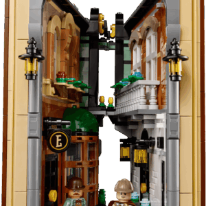 Sherlock Holmes Book Nook wooden 3D puzzle diorama showing an illuminated miniature library with a spiral staircase and warm chandelier lighting