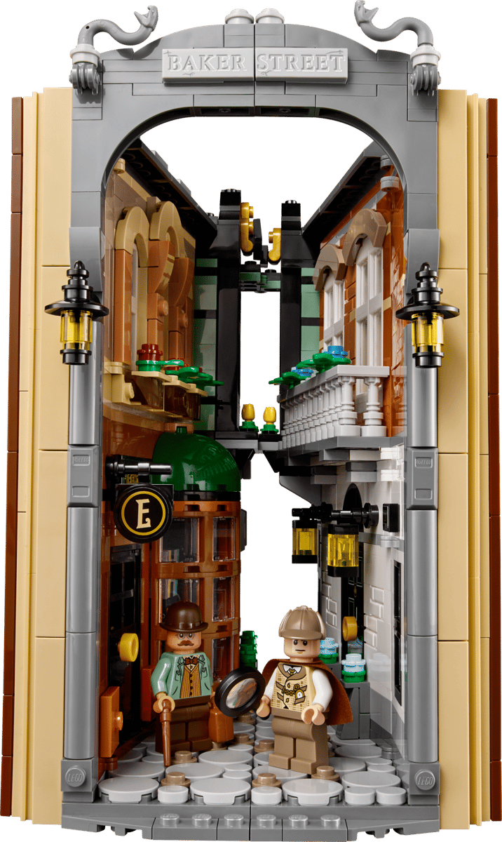 Sherlock Holmes Book Nook wooden 3D puzzle diorama showing an illuminated miniature library with a spiral staircase and warm chandelier lighting