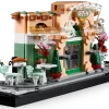 French Café Dust Enclosure holding the LEGO bistro set flush inside a packed home library bookshelf