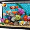 The factory packaging for a 3in1 fish tank representing the LEGO Aquarium Set showing colorful brick built tropical fish swimming behind a black frame