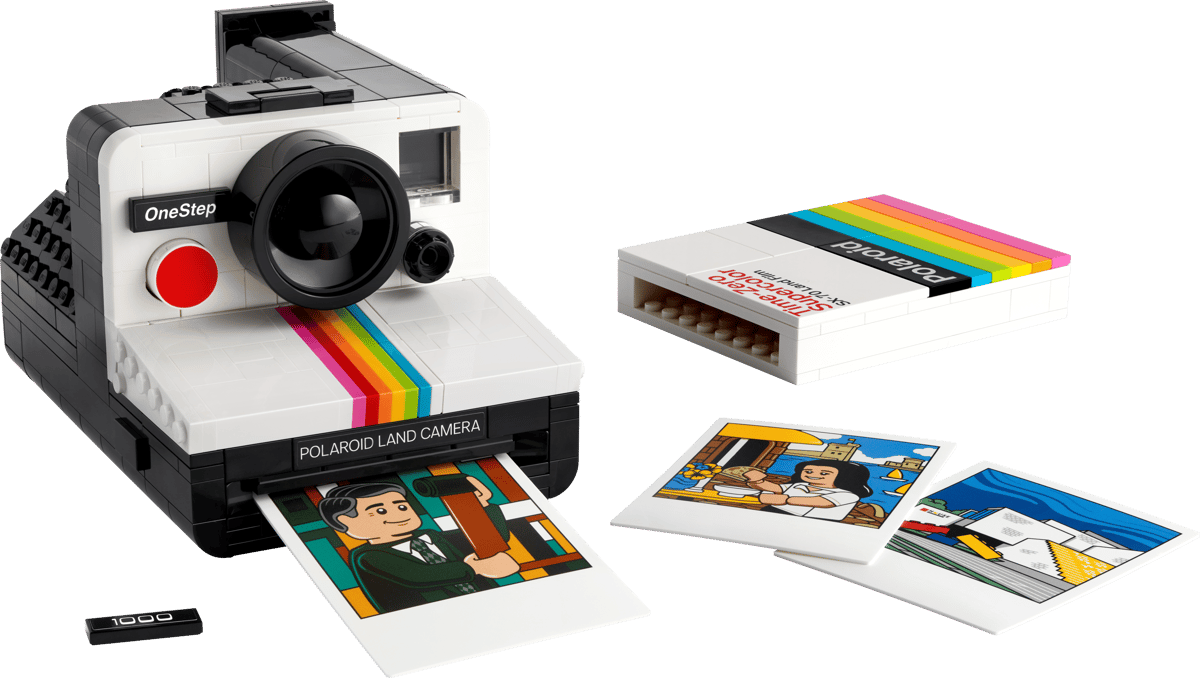 Premium Polaroid Camera Display Case enclosing the retro LEGO camera set on a workspace shelf