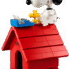 Snoopy Doghouse Display Case protecting the completed LEGO Peanuts build on a modern shelf