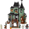 A detailed view of the microscale ballroom and ghost portrait tile inside the Spooky Manor Model