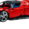 LEGO Ferrari Daytona SP3 Technic model built in striking classic racing red featuring sleek aerodynamic rear strakes and working butterfly doors opened wide
