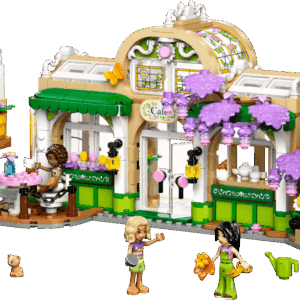 The built Plant Cafe and Flower Shop LEGO set showing a tan and green building with purple wisteria flowers a yellow tram car out front and several minidolls tending the gardens