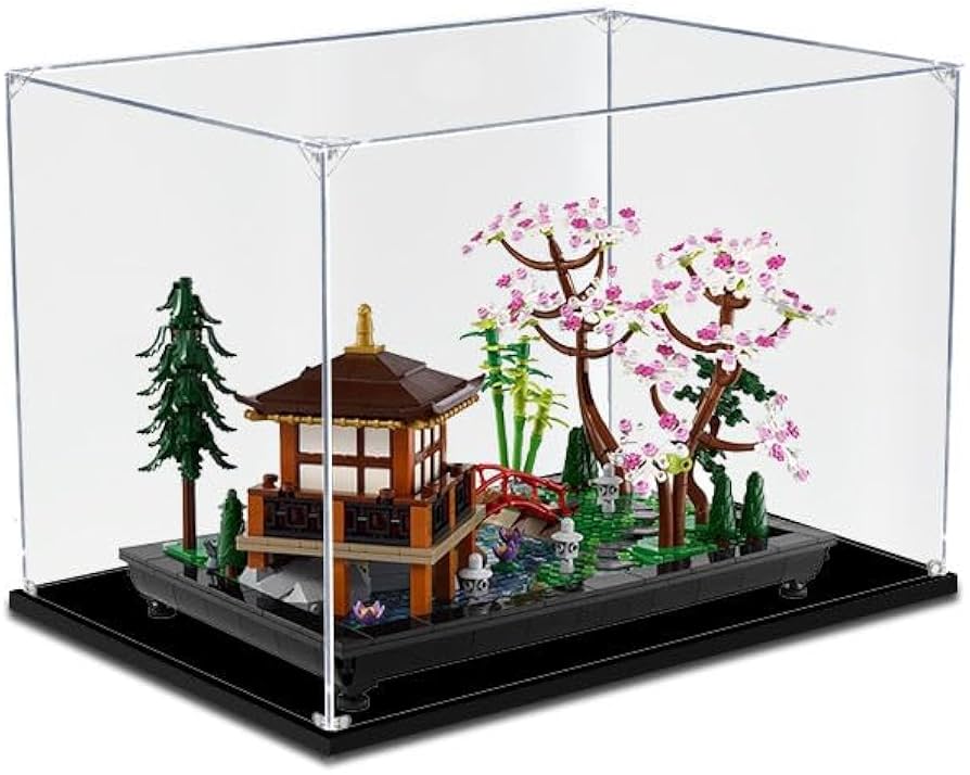 Medium BrickmonVault Dust-Free Protection display case holding an organized collection of minifigures on integrated tiered steps