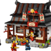LEGO 15th anniversary NINJAGO Blacksmith Forge 71858 set showing the hinged village forge split open to display the internal workshop
