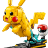The premium factory box art showcasing a large highly detailed brick built Pikachu figure dynamic leaping into the air next to a classic red and white Poke Ball model