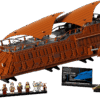 The factory box art displaying the massive premium dark orange brown brick build of the Jabbas Sail Barge UCS vehicle floating across a black collector background under real orange textile sails