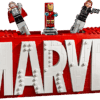 Wall mounted Marvel Logo Display Case loaded with LEGO bricks and dozens of comic minifigures