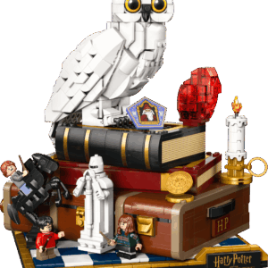 LEGO Sorcerer's Stone Collectors Edition model built showcasing a large glowing ruby red multi faceted alchemical gem resting on an ornate stone patterned display stand