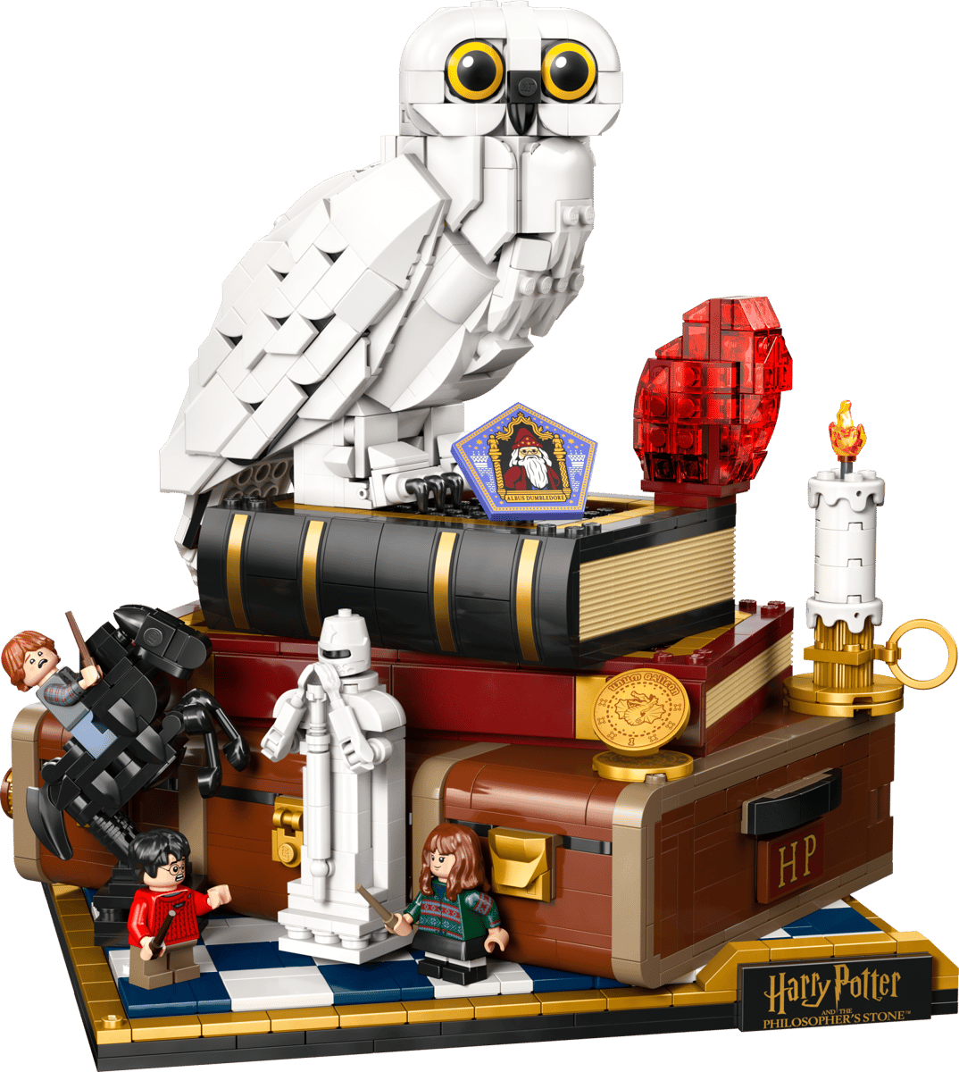 LEGO Sorcerer's Stone Collectors Edition model built showcasing a large glowing ruby red multi faceted alchemical gem resting on an ornate stone patterned display stand