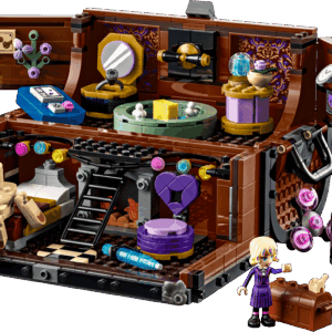 A beautiful macro display of the opened Wednesday LEGO Set showing Thing's trunk apartment split into two levels filled with a bed armchair and a miniature shower station
