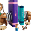 A close up view of the fully assembled Slinky Dog Bookends set showing the brick built dog spring sections extending out from purple and blue toy books