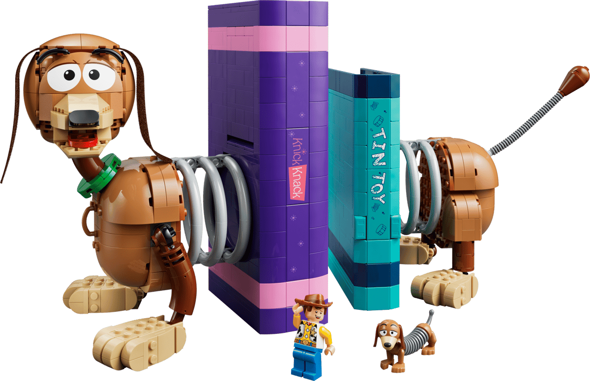 A close up view of the fully assembled Slinky Dog Bookends set showing the brick built dog spring sections extending out from purple and blue toy books