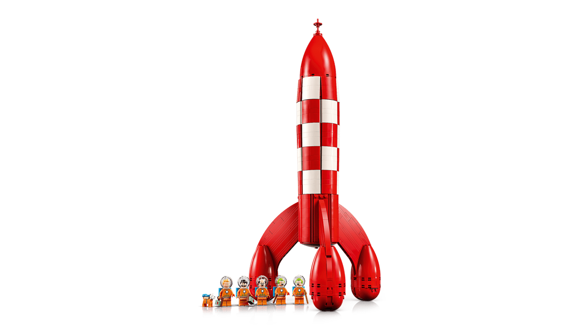 The LEGO Tintin Rocket Ideas set showing the brick-built red and white checkered rocket along with Tintin and Snowy minifigures in orange space suits