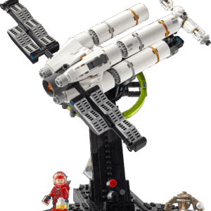 A detailed look at the Hail Mary LEGO model showing the white hull plating and the Technic centrifuge arms deployed outward